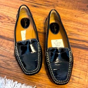 Shiny black Clark flats